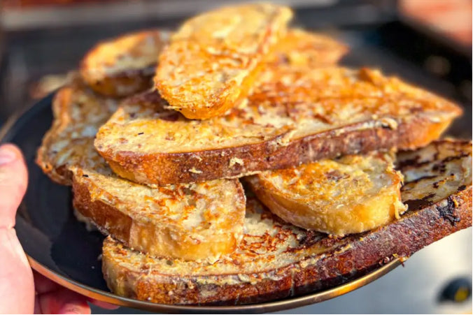 golden-brown French toast slices made from thick-cut sourdough bread