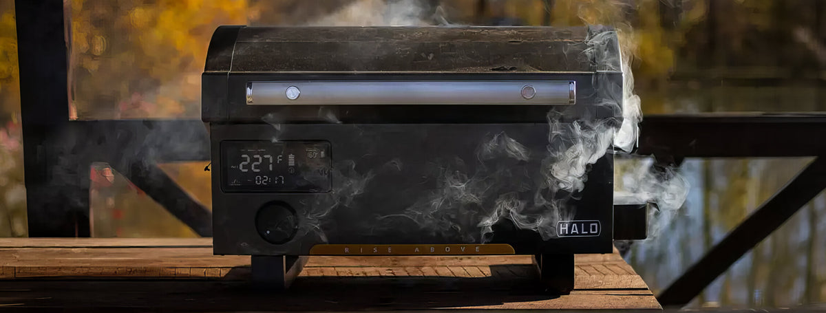 a man is grilling on an outdoor halo elite griddle