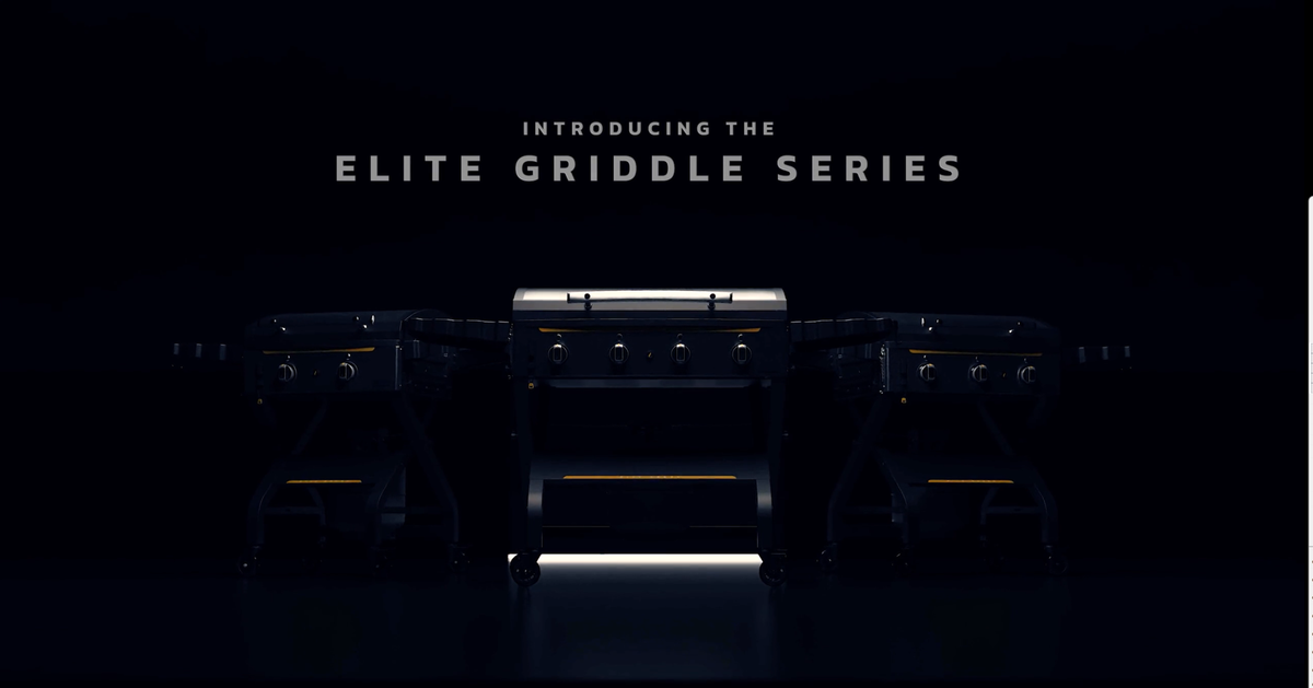 A couple enjoying a pizza from the HALO versa 16 pizza oven