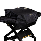 Weatherproof black HALO elite series grill cover fitted over a grill