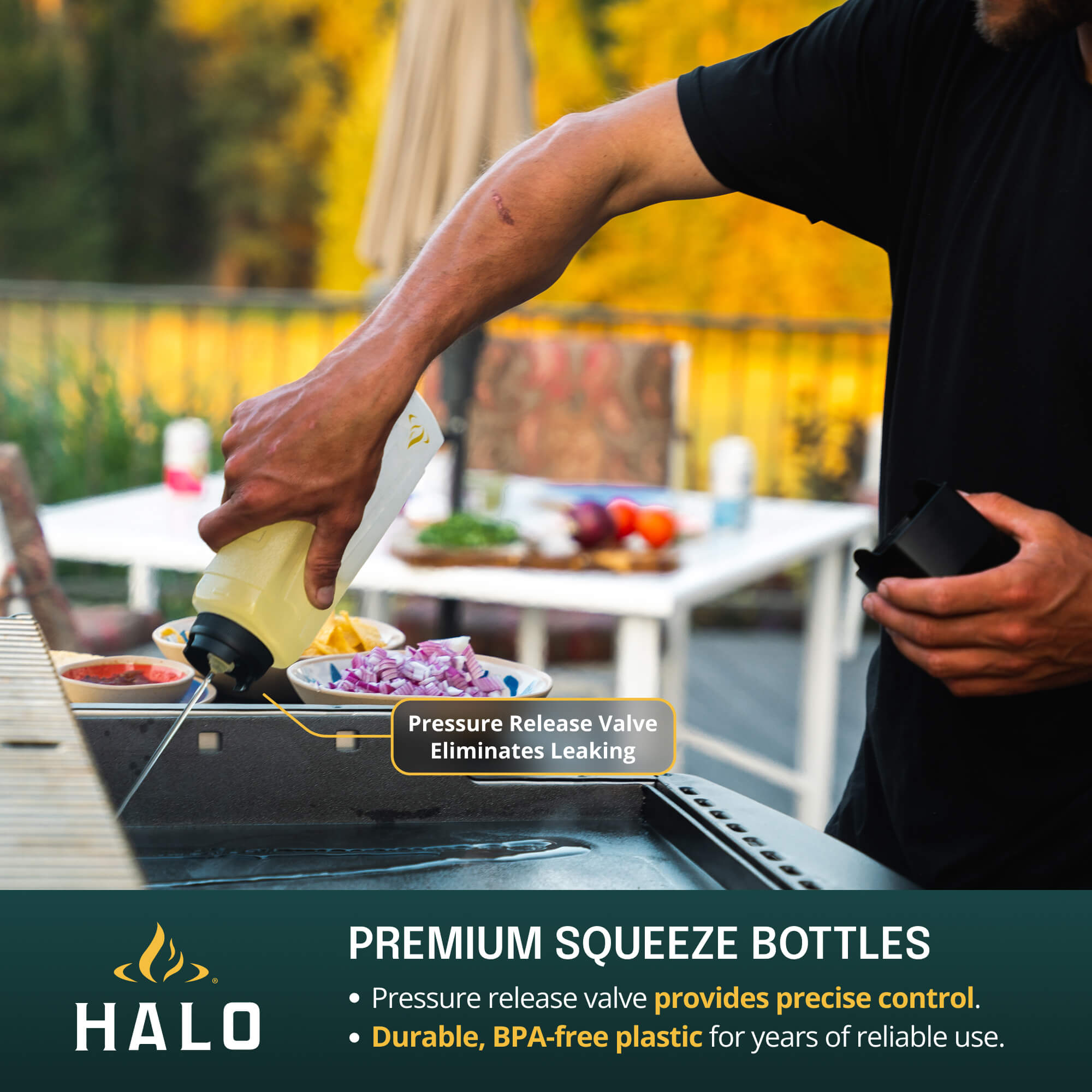 Person using a Halo squeeze bottle on a grill with outdoor setting