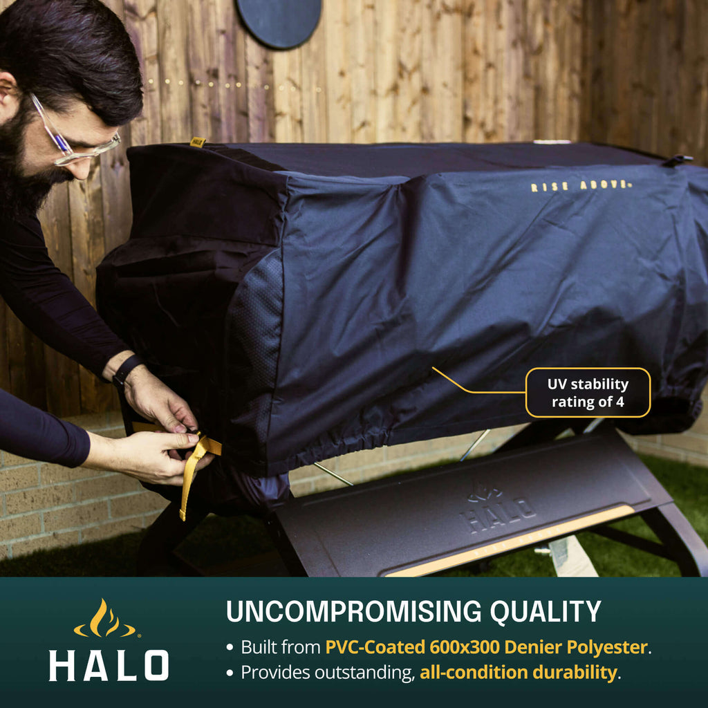 Person securing a large cover over the HALO Elite Series Griddle