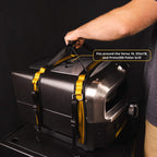 Person lifting a HALO Versa 16 pizza oven with heavy-duty carrying straps.