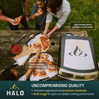 Overhead shot of a family slicing fresh pizza next to the HALO Versa 16 pizza oven, featuring callouts