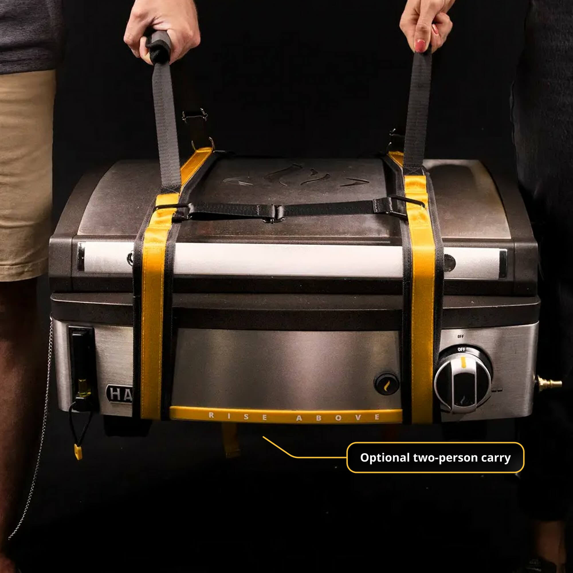 Person transporting the Elite1B griddle using heavy-duty appliance lifting straps.