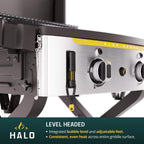 Close-up of a Halo griddle with bubble level and adjustable feet, on a white background.