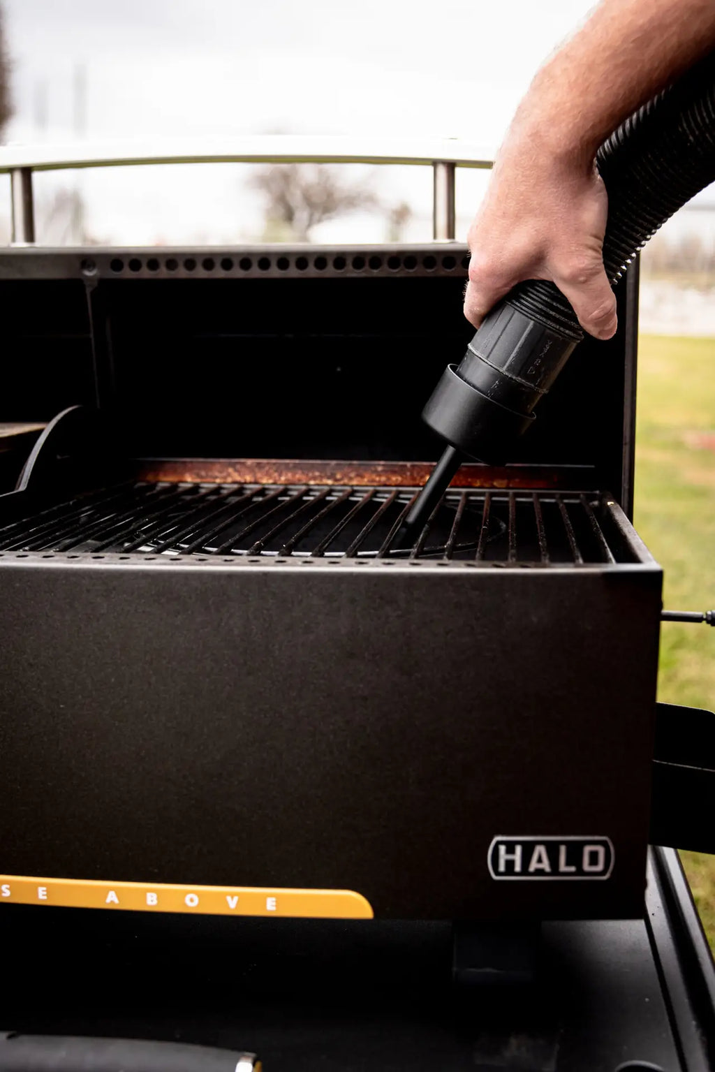 Using a burn pot attachment to deep clean the pellet grill