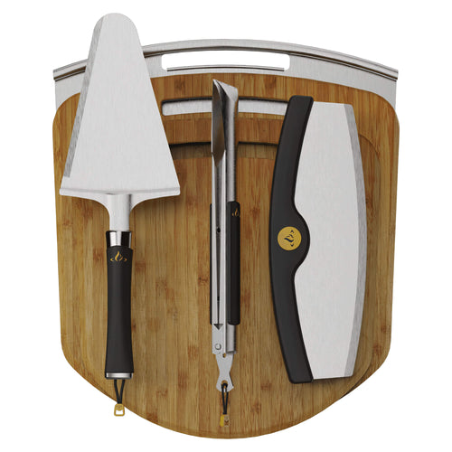 Six-piece HALO Cook + Serve Pizza Kit featuring two bamboo peels, one stainless steel peel, a mezzaluna cutter, tongs, and a universal server handle.
