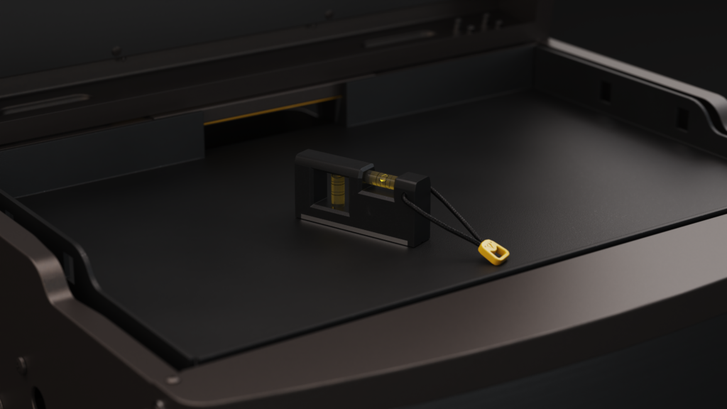 A bubble level tool resting on the flat cooking surface of a HALO Elite griddle
